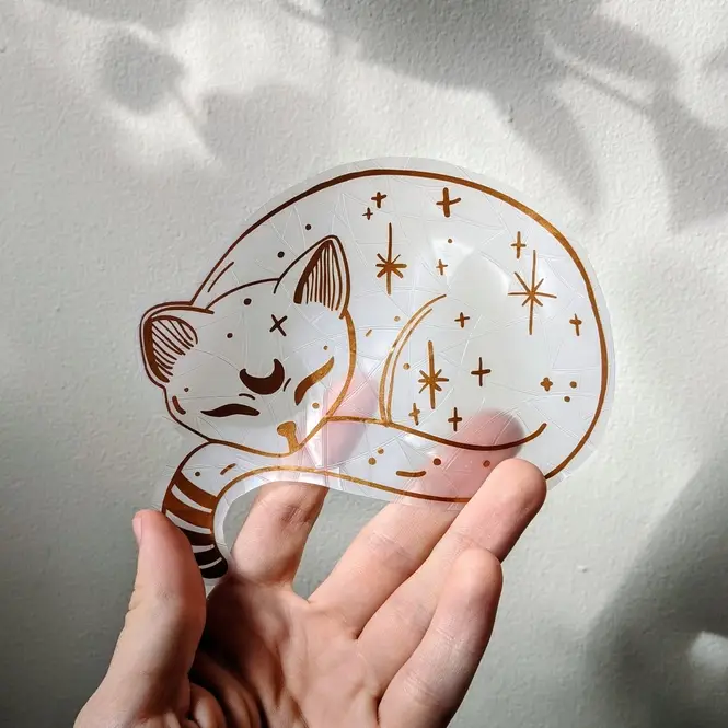 Sticker attrape soleil en forme de chat pour créer des arcs en ciel