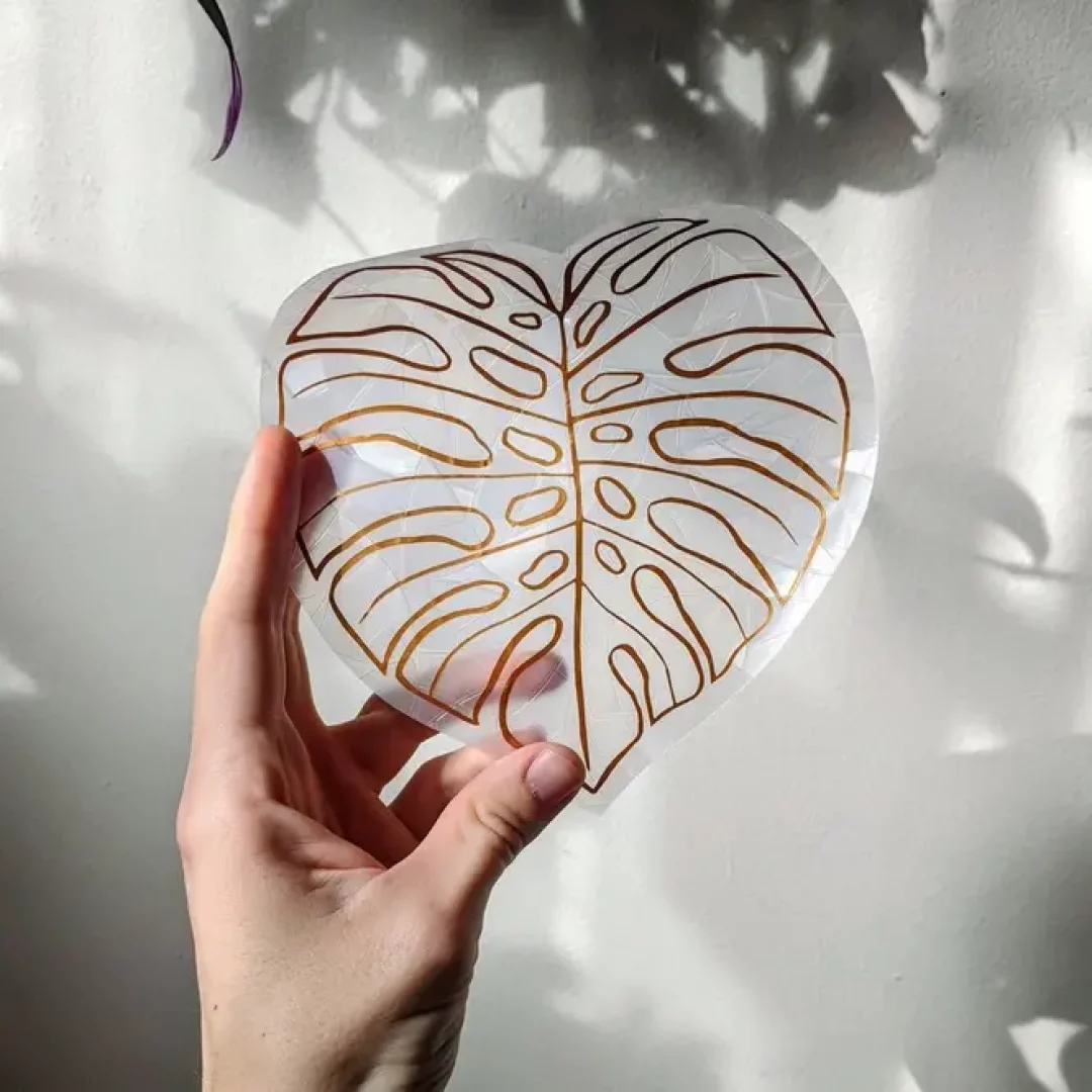Attrape soleil en forme de feuille